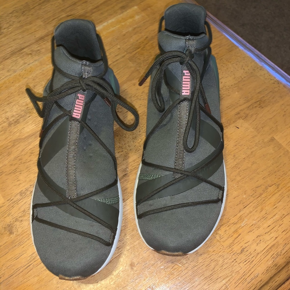 Olive green Puma sneakers with rose gold accents